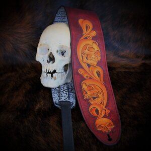 Hand-Carved Leather & Wildebeest Guitar Strap by Slickbald Customs